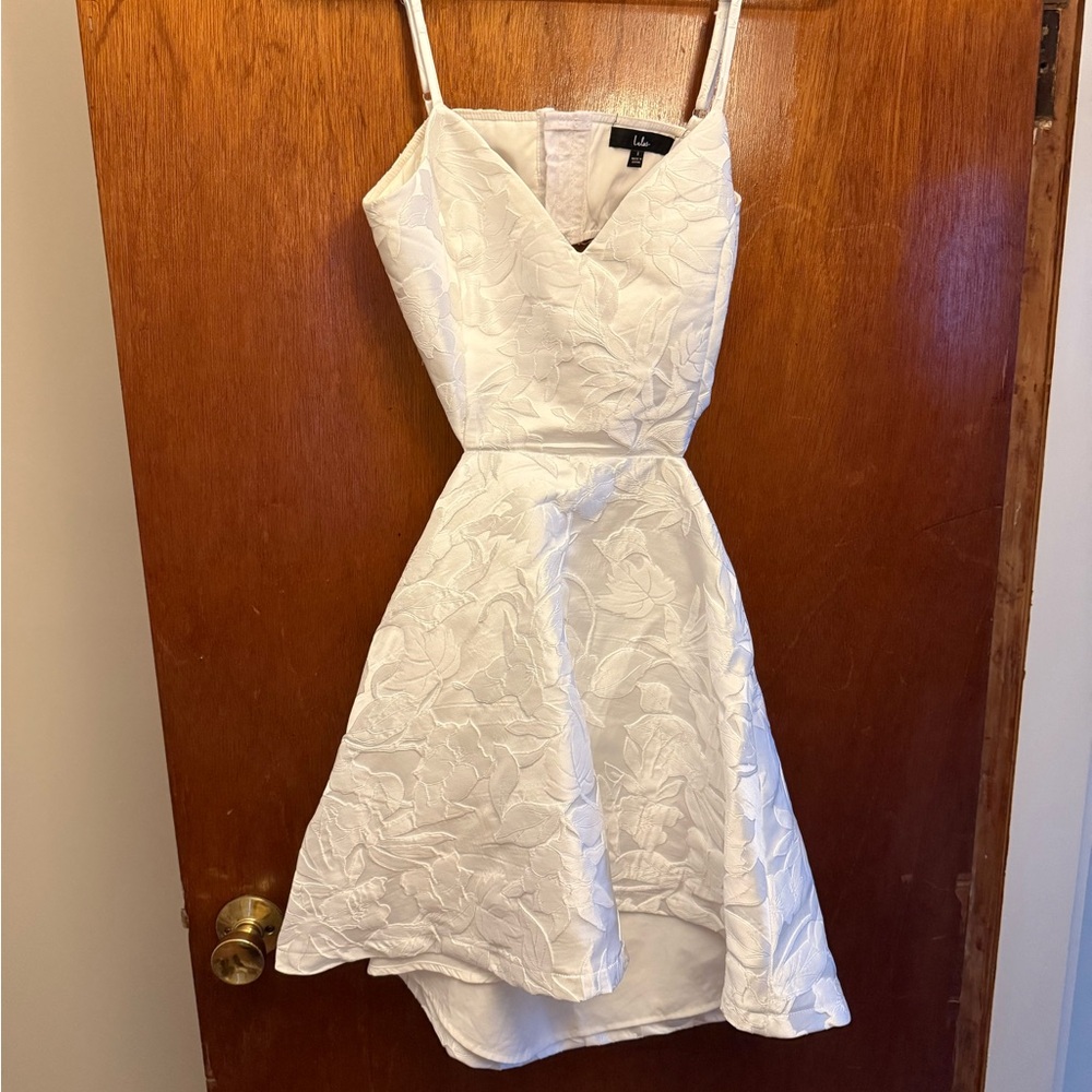 Lulu's White Cut Out Mini Bow Dress